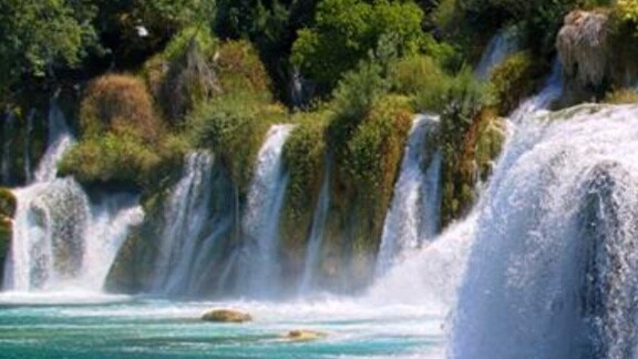 View of waterfalls in greenery around